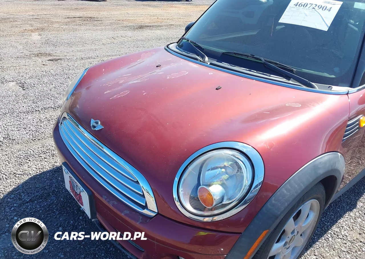 2009 Mini Cooper VIN:WMWMF33599TW72334 - 6