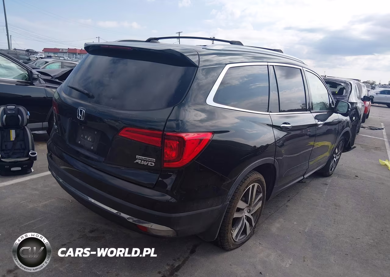2017 Honda Pilot Touring VIN:5FNYF6H95HB035797 - 4