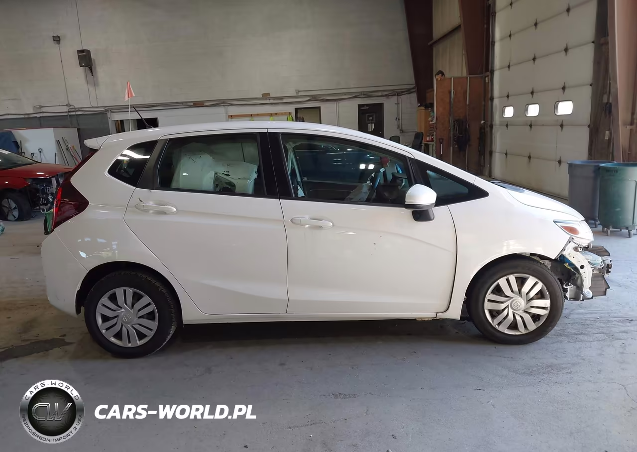 2015 Honda Fit Lx VIN:3HGGK5H56FM725003 - 14