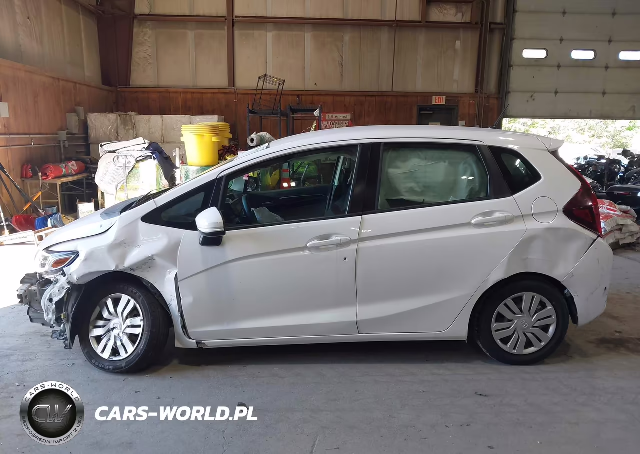 2015 Honda Fit Lx VIN:3HGGK5H56FM725003 - 15