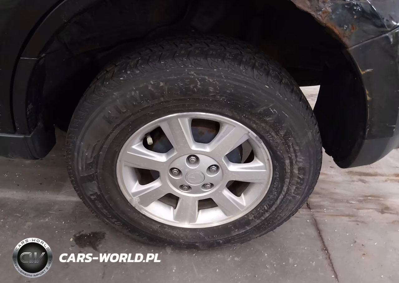 2011 Mazda Tribute S Grand Touring VIN:4F2CY9GG1BKM06244 - 12