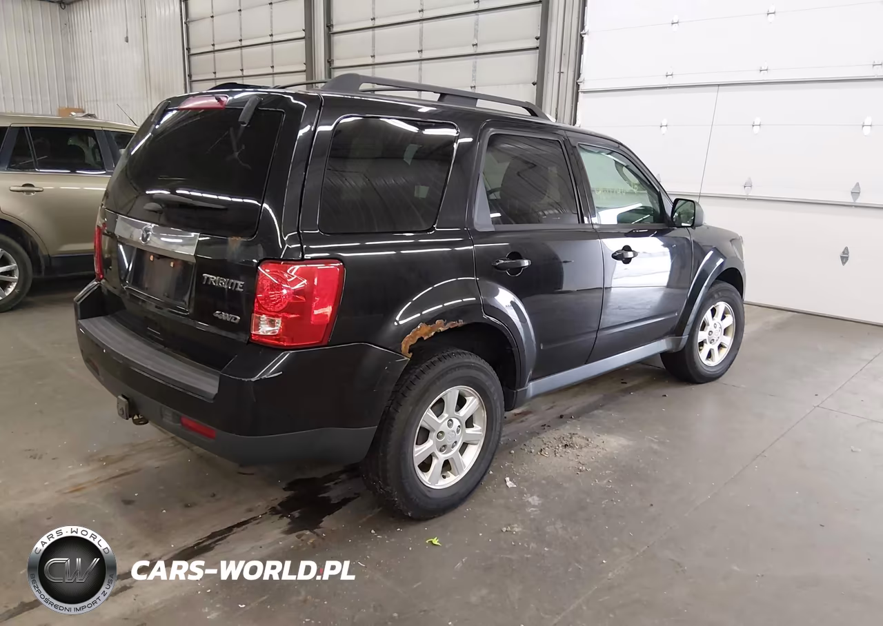 2011 Mazda Tribute S Grand Touring VIN:4F2CY9GG1BKM06244 - 4