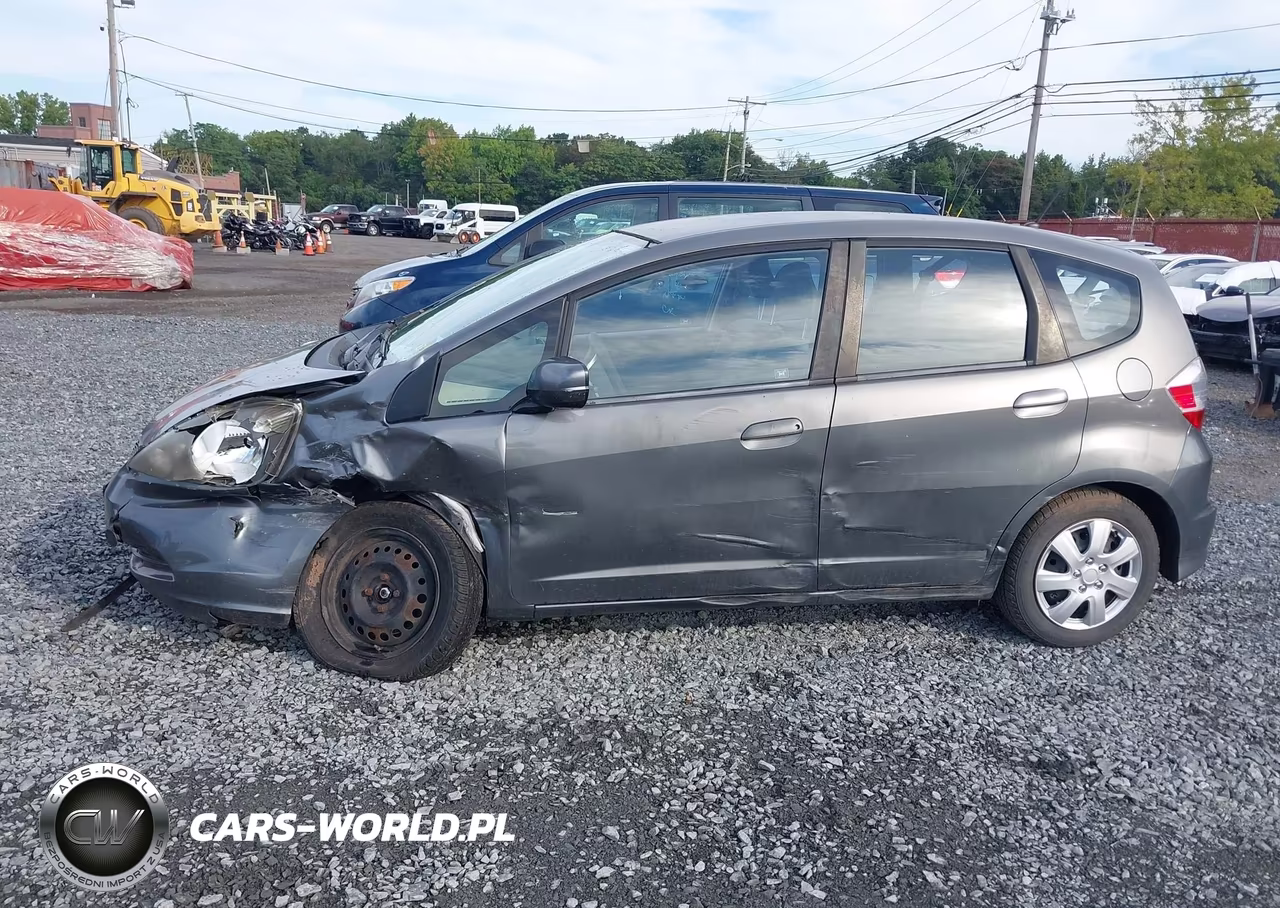 2013 Honda Fit VIN:JHMGE8H35DC074398 - 14