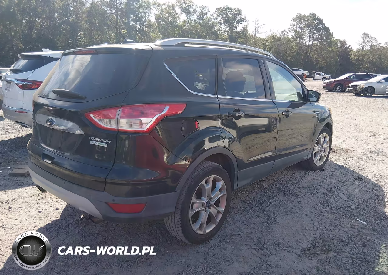 2015 Ford Escape Titanium VIN:1FMCU0J99FUC01844 - 4