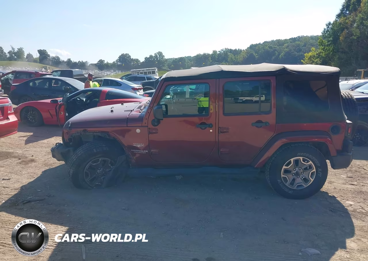 2010 Jeep Wrangler Unlimited Sahara VIN:1J4BA5H18AL122633 - 14