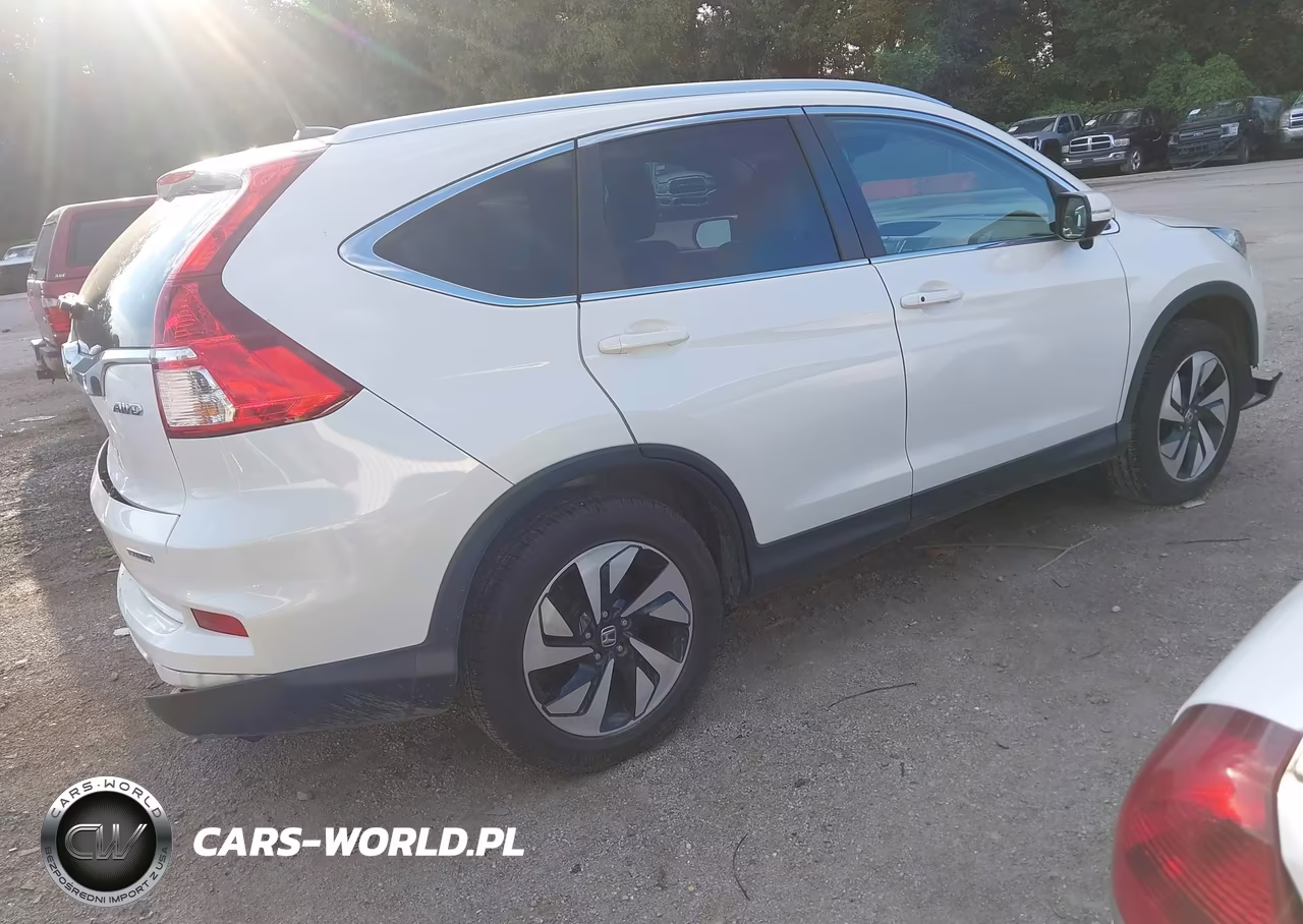 2015 Honda Cr-V Touring VIN:5J6RM4H90FL129167 - 4