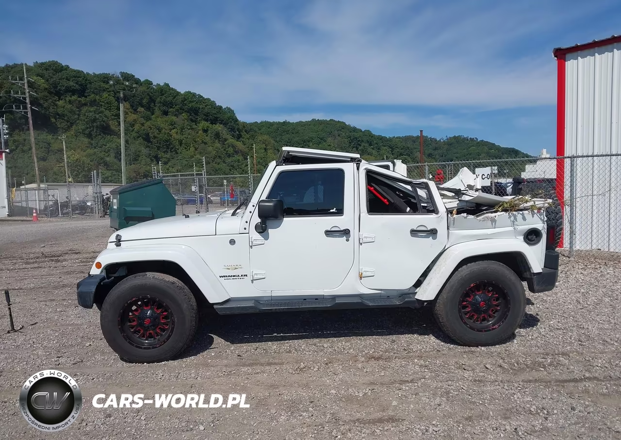 2015 Jeep Wrangler Unlimited Sahara VIN:1C4BJWEG2FL767144 - 14