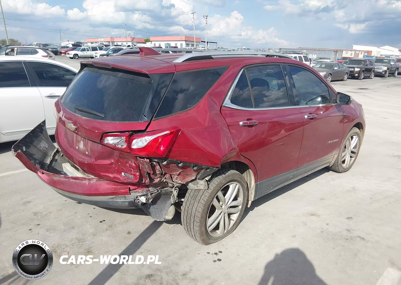 2018 Chevrolet Equinox Premier VIN:3GNAXMEV6JS539980 - 4