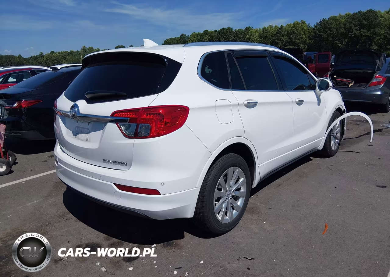 2018 Buick Envision Essence VIN:LRBFX1SAXJD115733 - 4