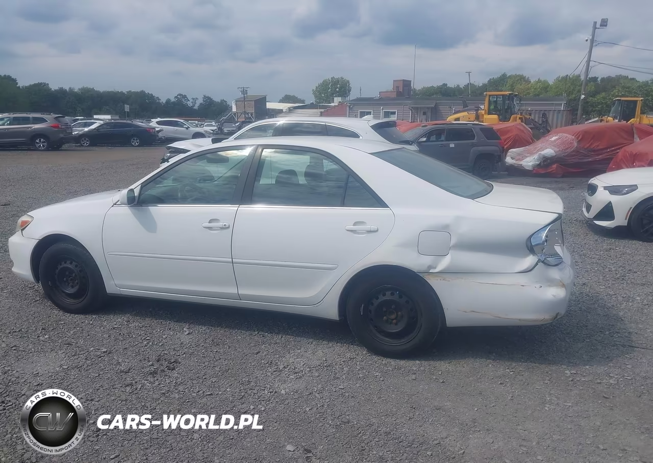 2003 Toyota Camry Le VIN:JTDBE32K930169044 - 14