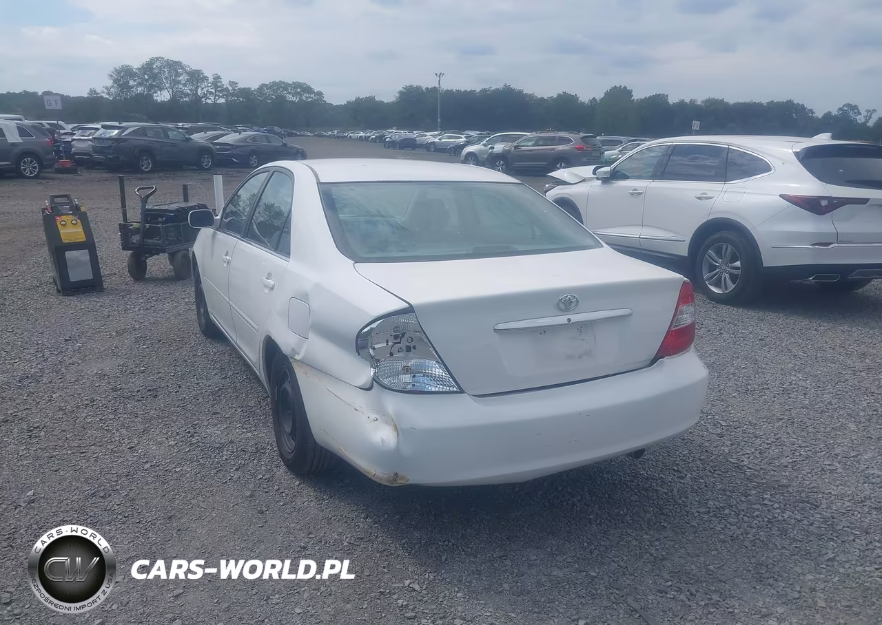 2003 Toyota Camry Le VIN:JTDBE32K930169044 - 17