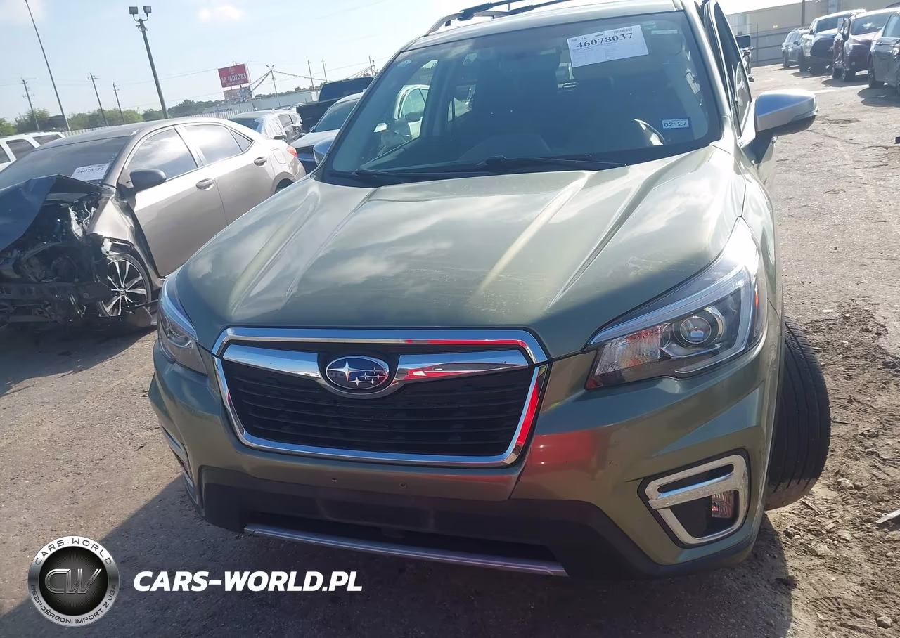 2019 Subaru Forester Touring VIN:JF2SKAWC0KH478208 - 12
