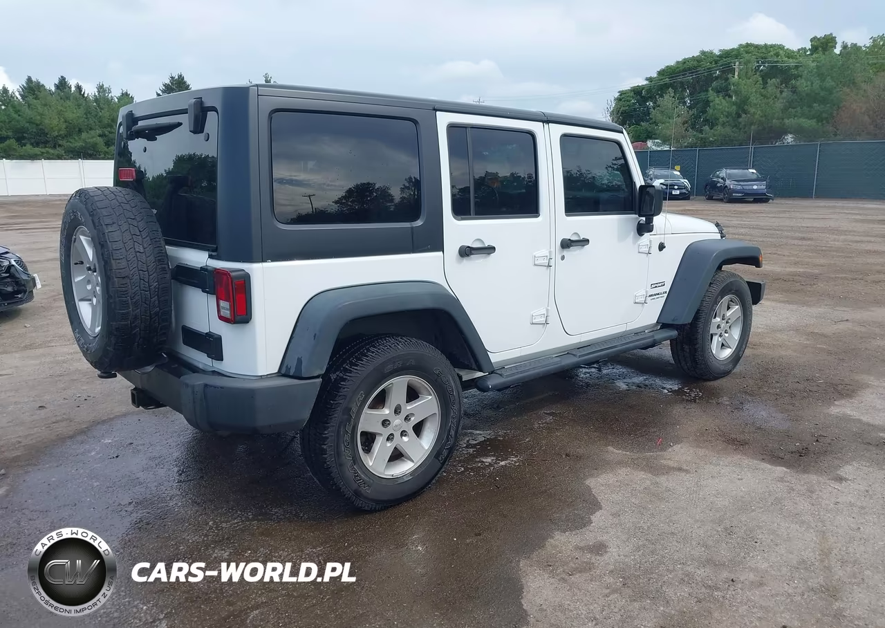 2015 Jeep Wrangler Unlimited Sport VIN:1C4BJWDG9FL518891 - 4
