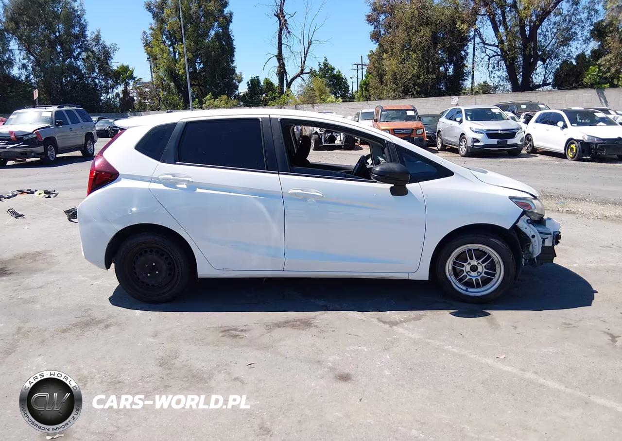 2016 Honda Fit Lx VIN:JHMGK5H55GX016815 - 14