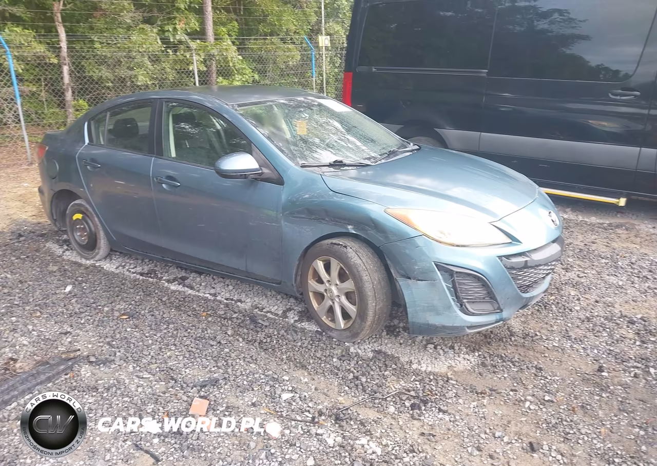2011 Mazda Mazda3 I Touring VIN:JM1BL1VG4B1420997 - 1