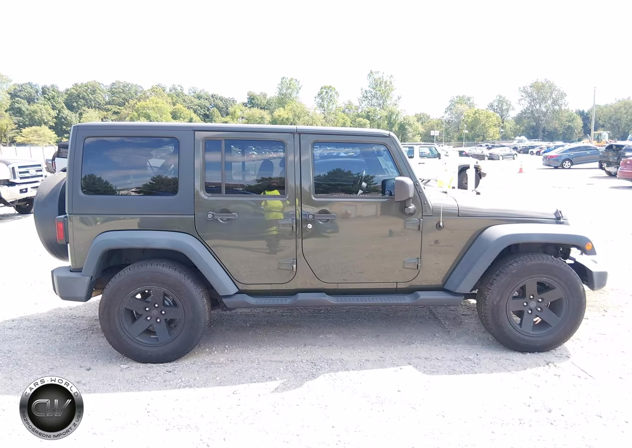 2015 Jeep Wrangler Unlimited Sport VIN:1C4HJWDG0FL762861 - 13