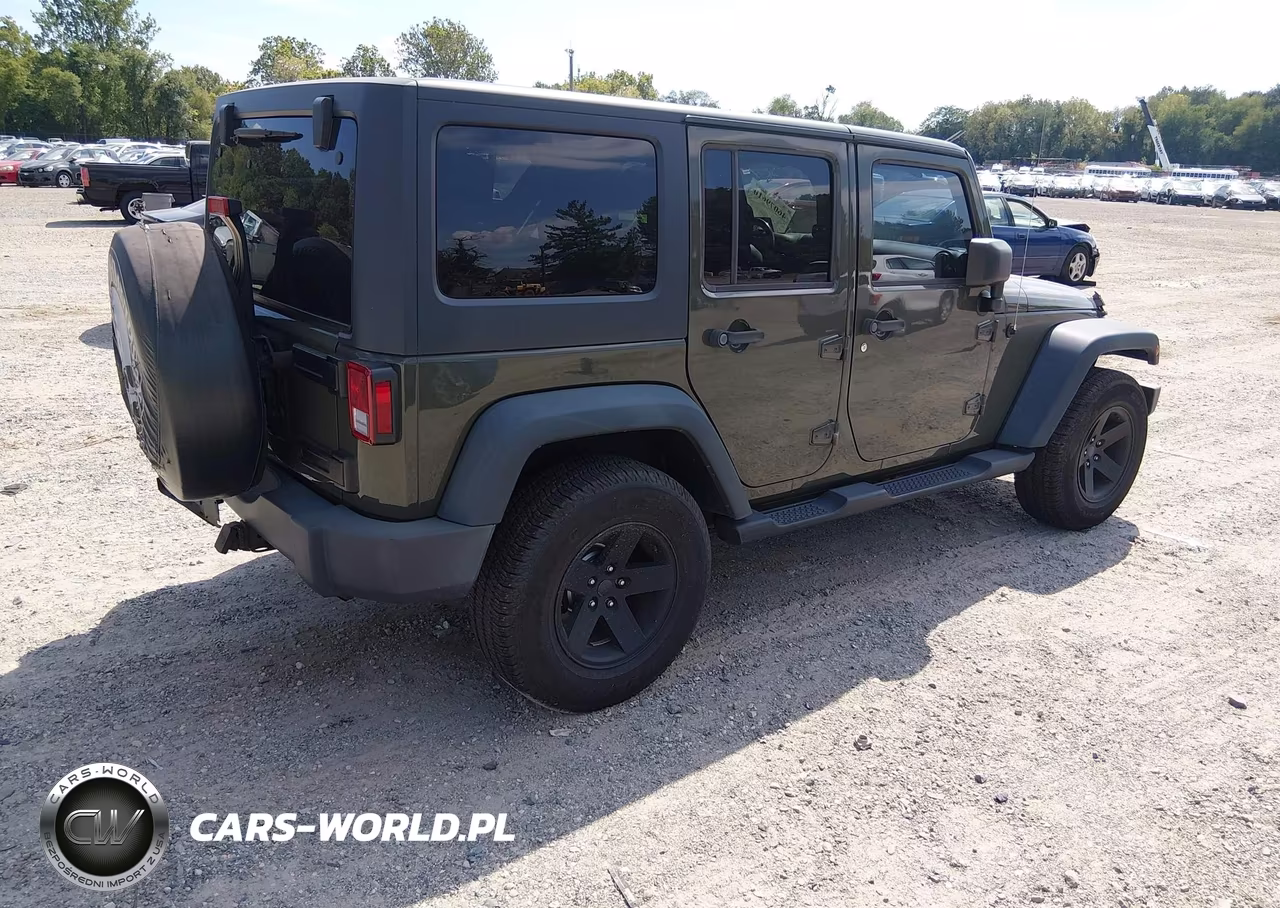 2015 Jeep Wrangler Unlimited Sport VIN:1C4HJWDG0FL762861 - 4