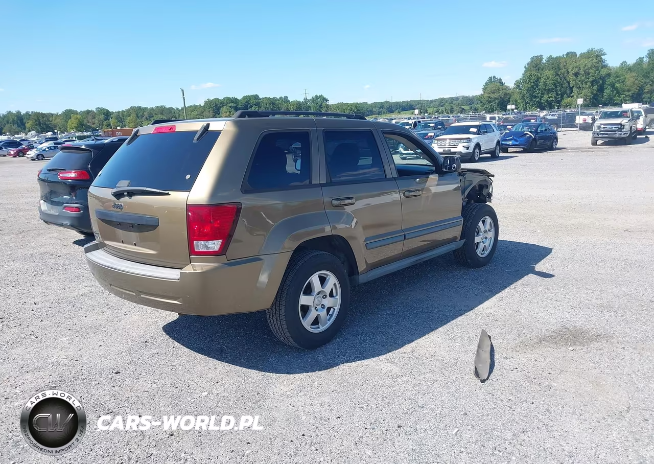 2009 Jeep Grand Cherokee Laredo VIN:1J8GR48KX9C556595 - 4