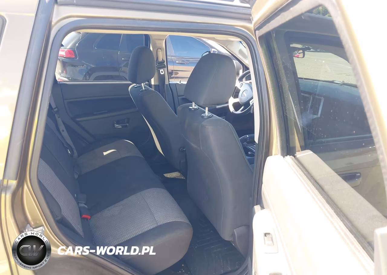 2009 Jeep Grand Cherokee Laredo VIN:1J8GR48KX9C556595 - 8