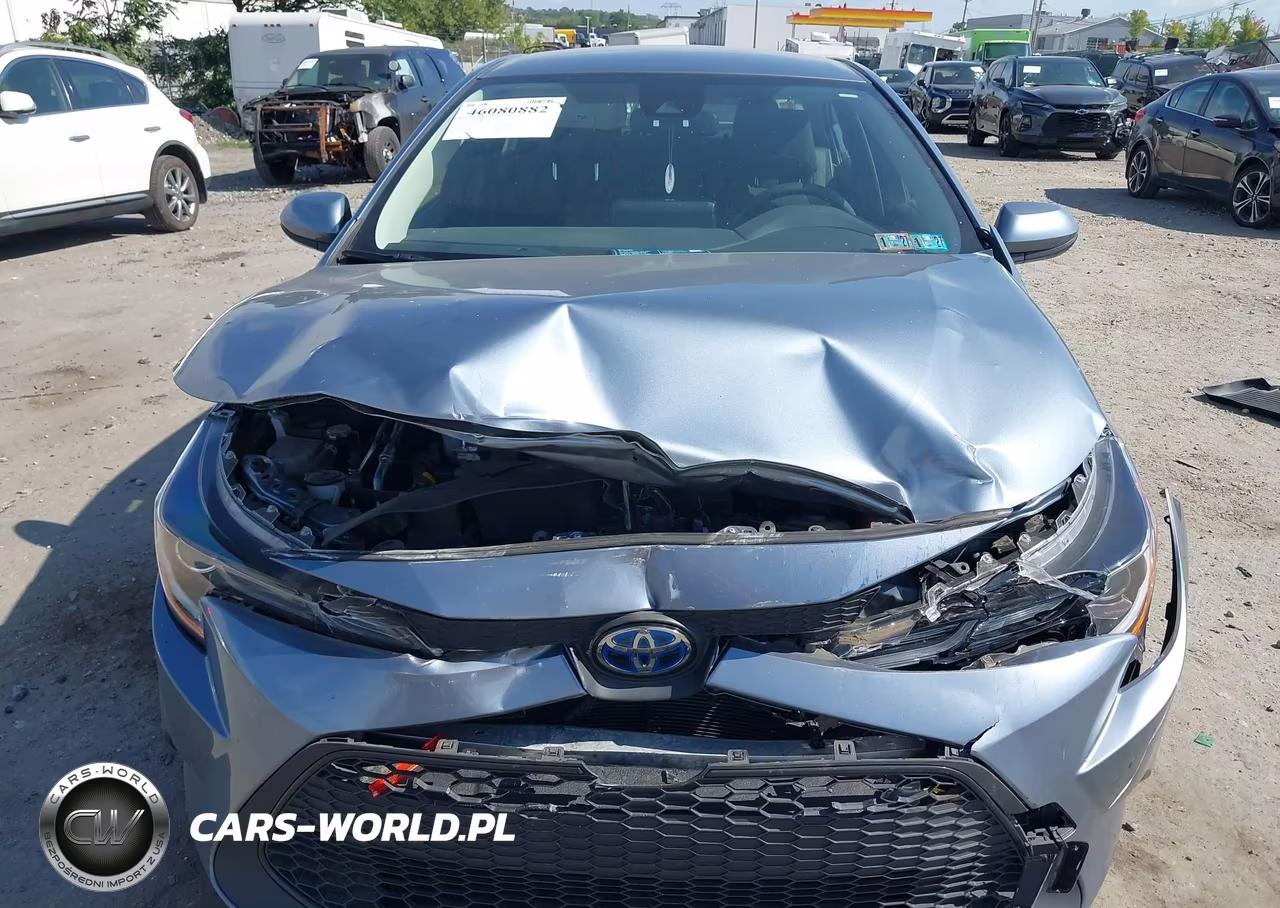 2022 Toyota Corolla Hybrid Le VIN:JTDEAMDE5N3013722 - 12