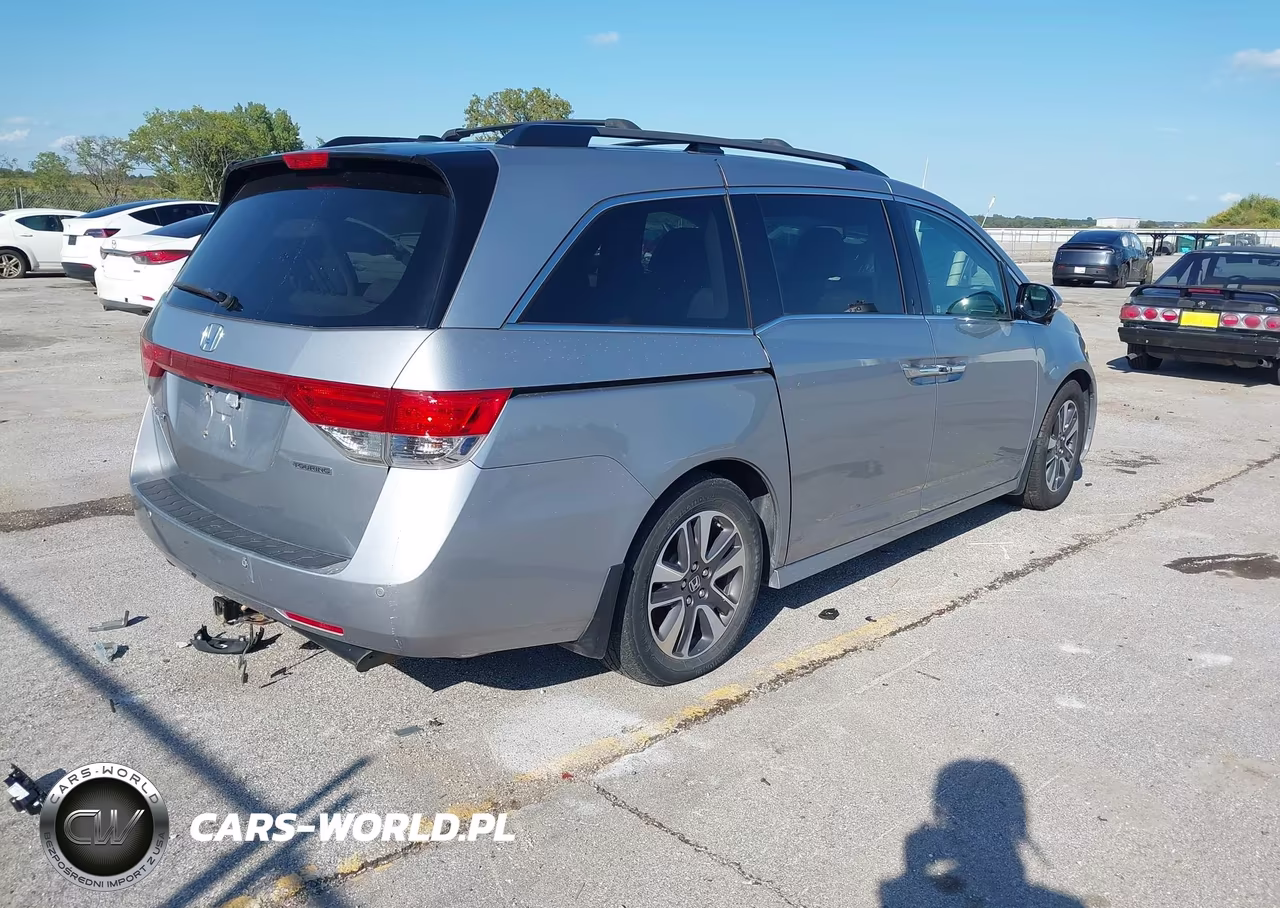 2016 Honda Odyssey Touring-Touring Elite VIN:5FNRL5H94GB097312 - 4