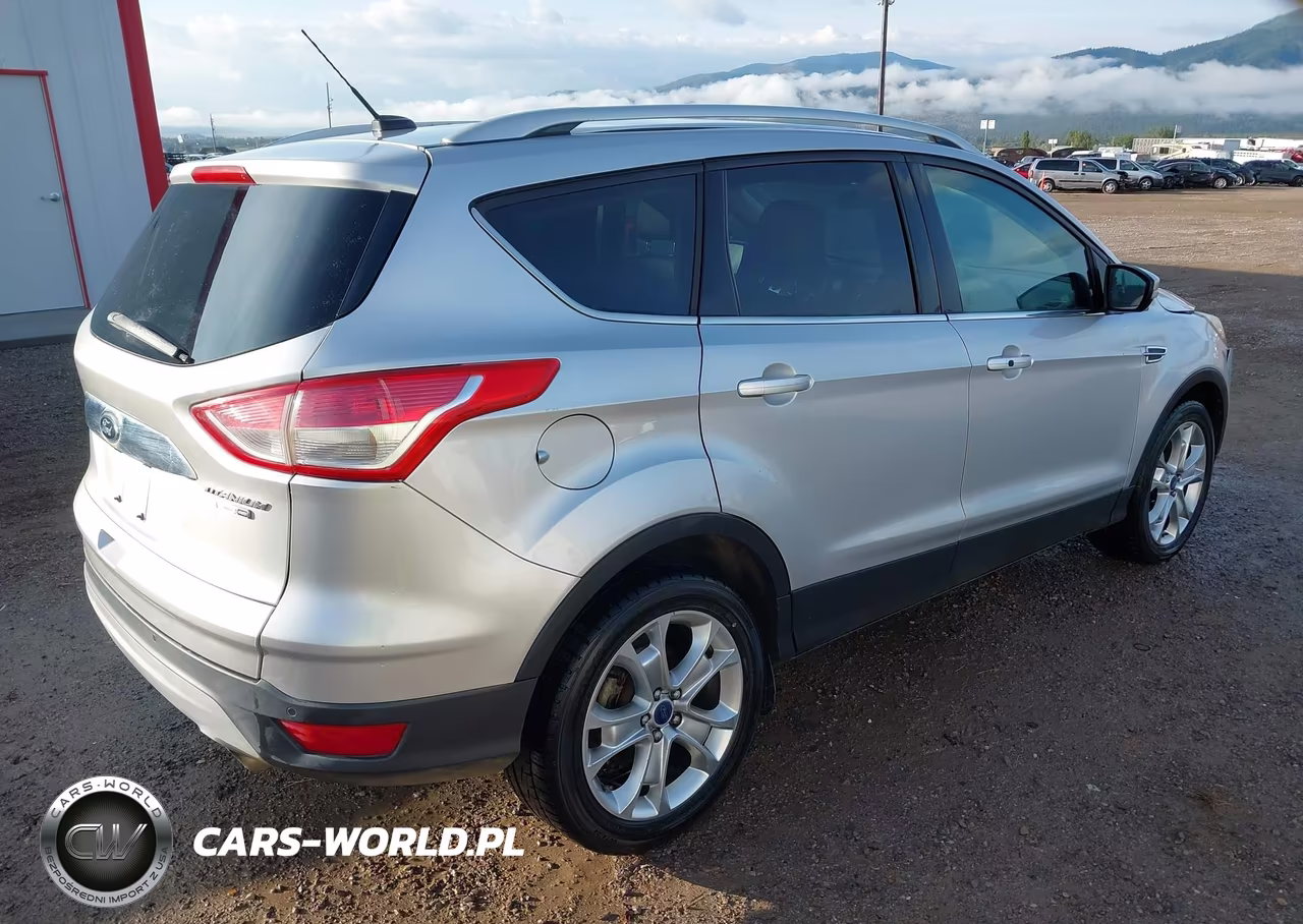2016 Ford Escape Titanium VIN:1FMCU9JX6GUC24082 - 4