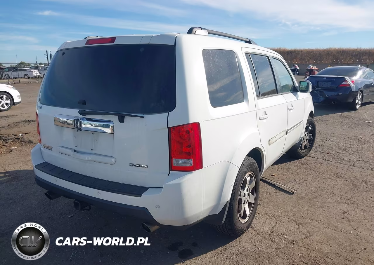 2010 Honda Pilot Touring VIN:5FNYF3H95AB008877 - 4