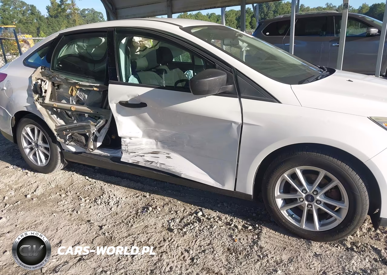 2018 Ford Focus S VIN:1FADP3E21JL220830 - 13