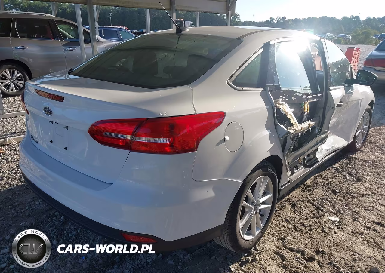 2018 Ford Focus S VIN:1FADP3E21JL220830 - 4