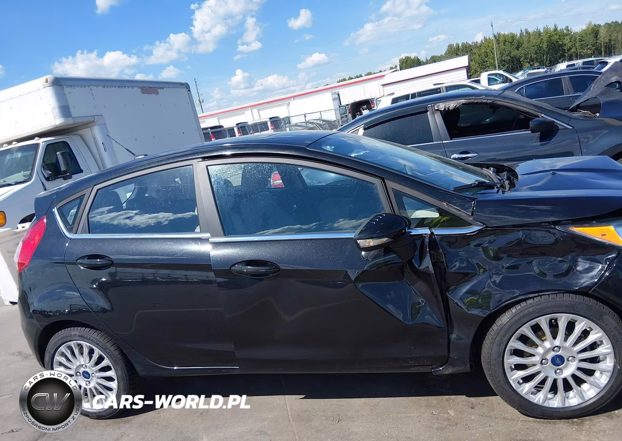 2015 Ford Fiesta Titanium VIN:3FADP4FJ2FM191775 - 13