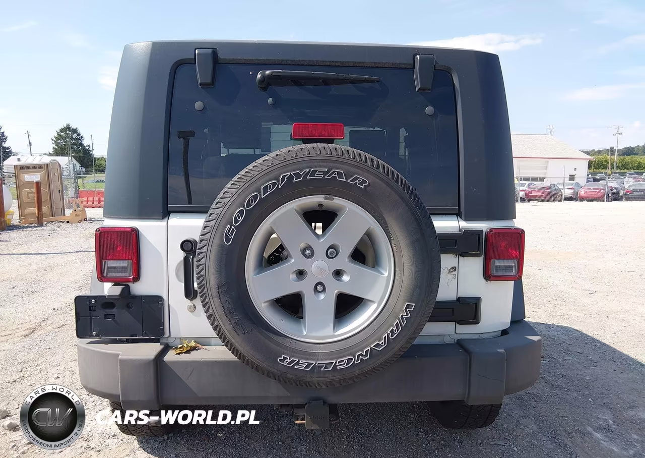 2010 Jeep Wrangler Sport VIN:1J4AA2D11AL171320 - 16