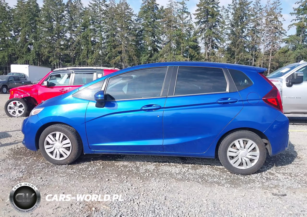 2015 Honda Fit Lx VIN:3HGGK5H58FM718361 - 14