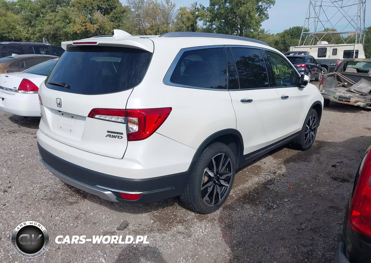 2019 Honda Pilot Touring VIN:5FNYF6H64KB055830 - 4