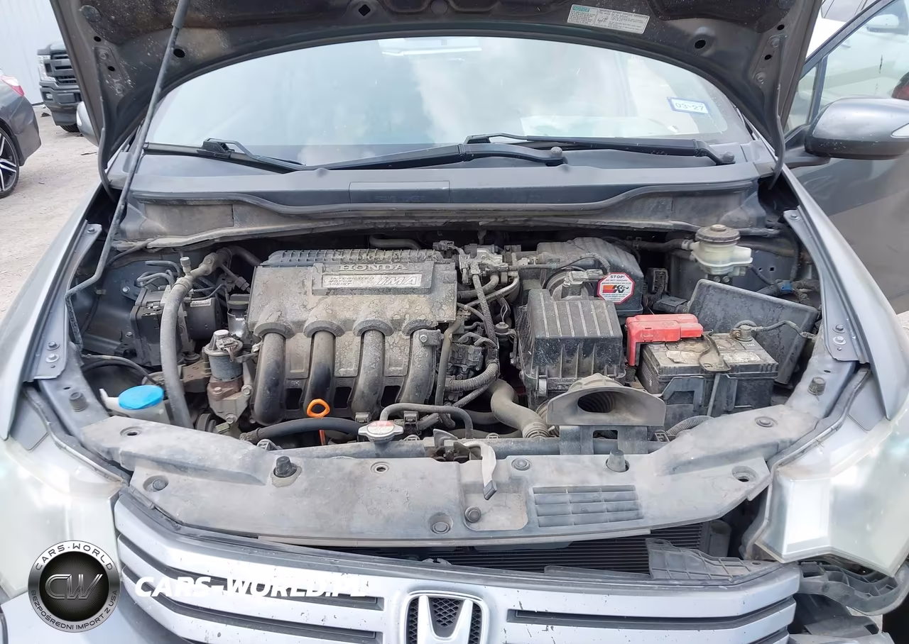 2010 Honda Insight Ex VIN:JHMZE2H72AS024665 - 10