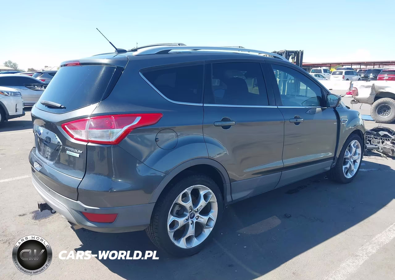 2015 Ford Escape Titanium VIN:1FMCU0J92FUA25736 - 4
