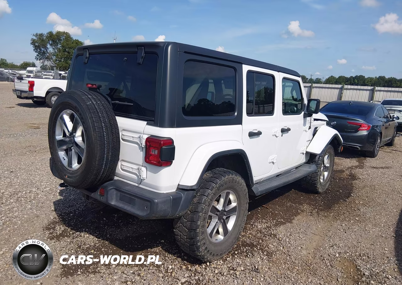 2019 Jeep Wrangler Unlimited Sahara 4X4 VIN:1C4HJXEN4KW595593 - 4