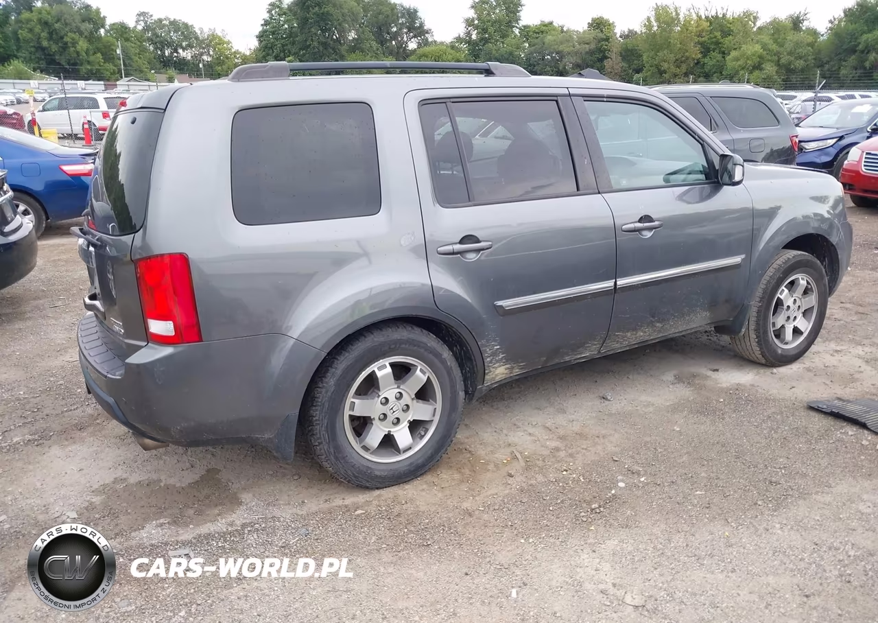 2011 Honda Pilot Touring VIN:5FNYF4H98BB074640 - 4