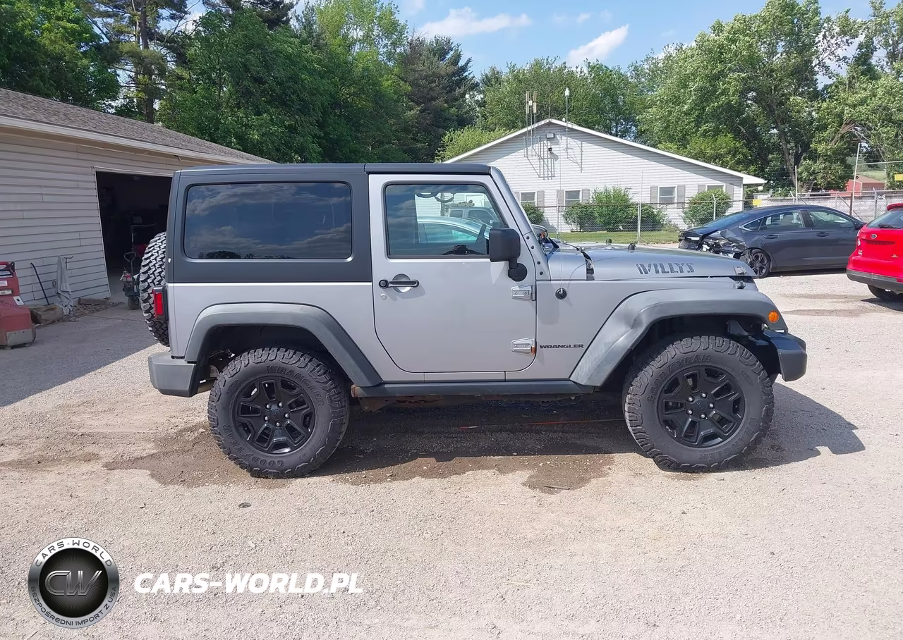 2014 Jeep Wrangler Willys Wheeler VIN:1C4AJWAG0EL210183 - 14