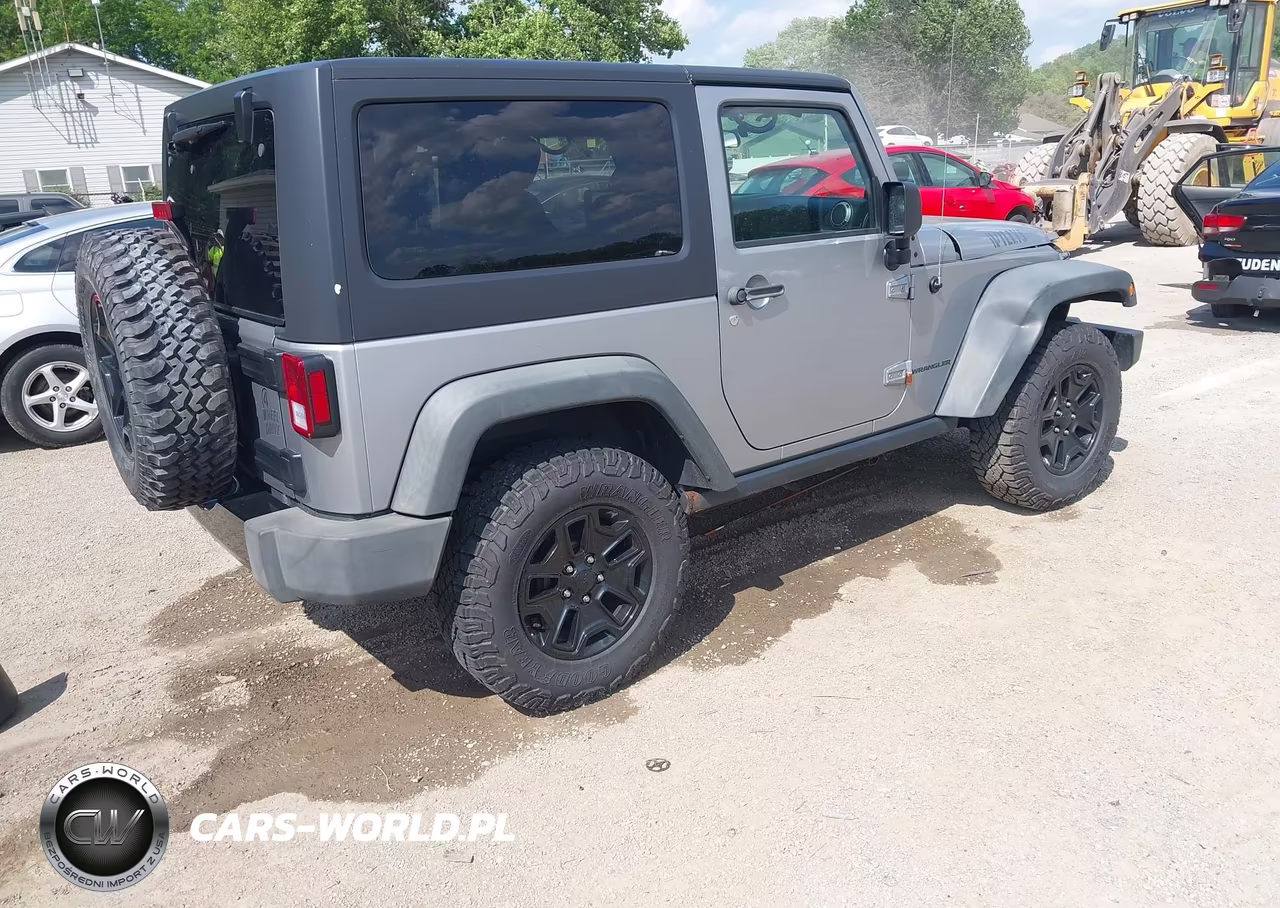 2014 Jeep Wrangler Willys Wheeler VIN:1C4AJWAG0EL210183 - 4