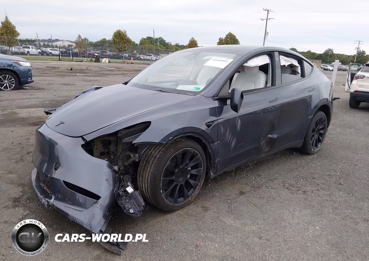 2023 Tesla Model Y Awd-Long Range Dual Motor All-Wheel Drive VIN:7SAYGDEE9PF597576 - 2