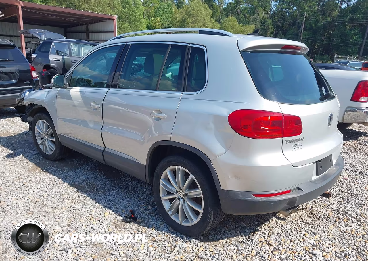 2012 Volkswagen Tiguan Se VIN:WVGAV7AX2CW523673 - 3