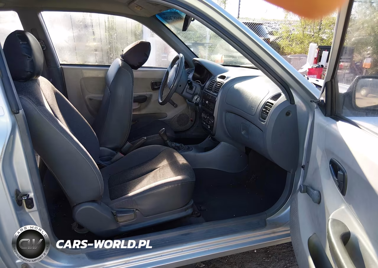 2002 Hyundai Accent L VIN:KMHCF35G52U177377 - 5