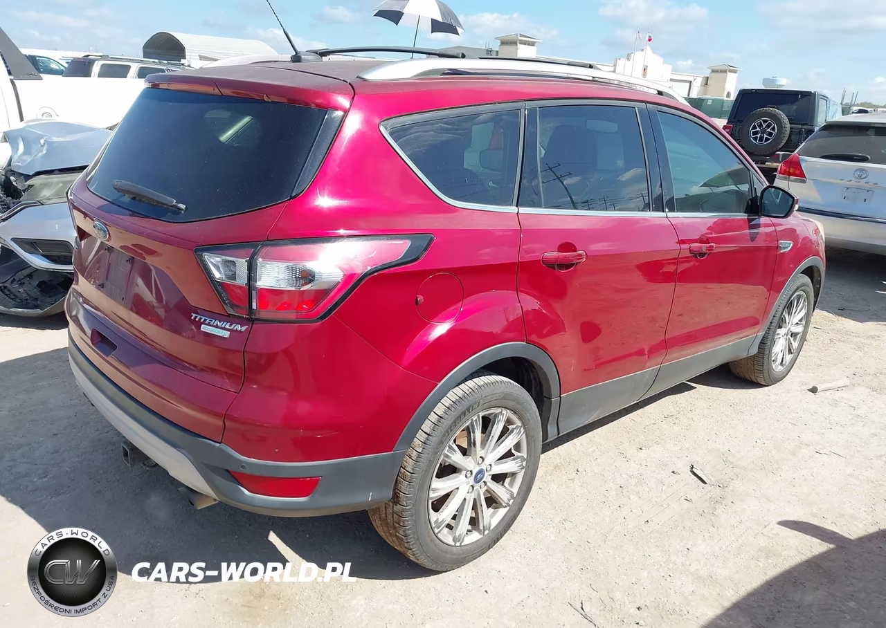2017 Ford Escape Titanium VIN:1FMCU0J99HUC14600 - 4