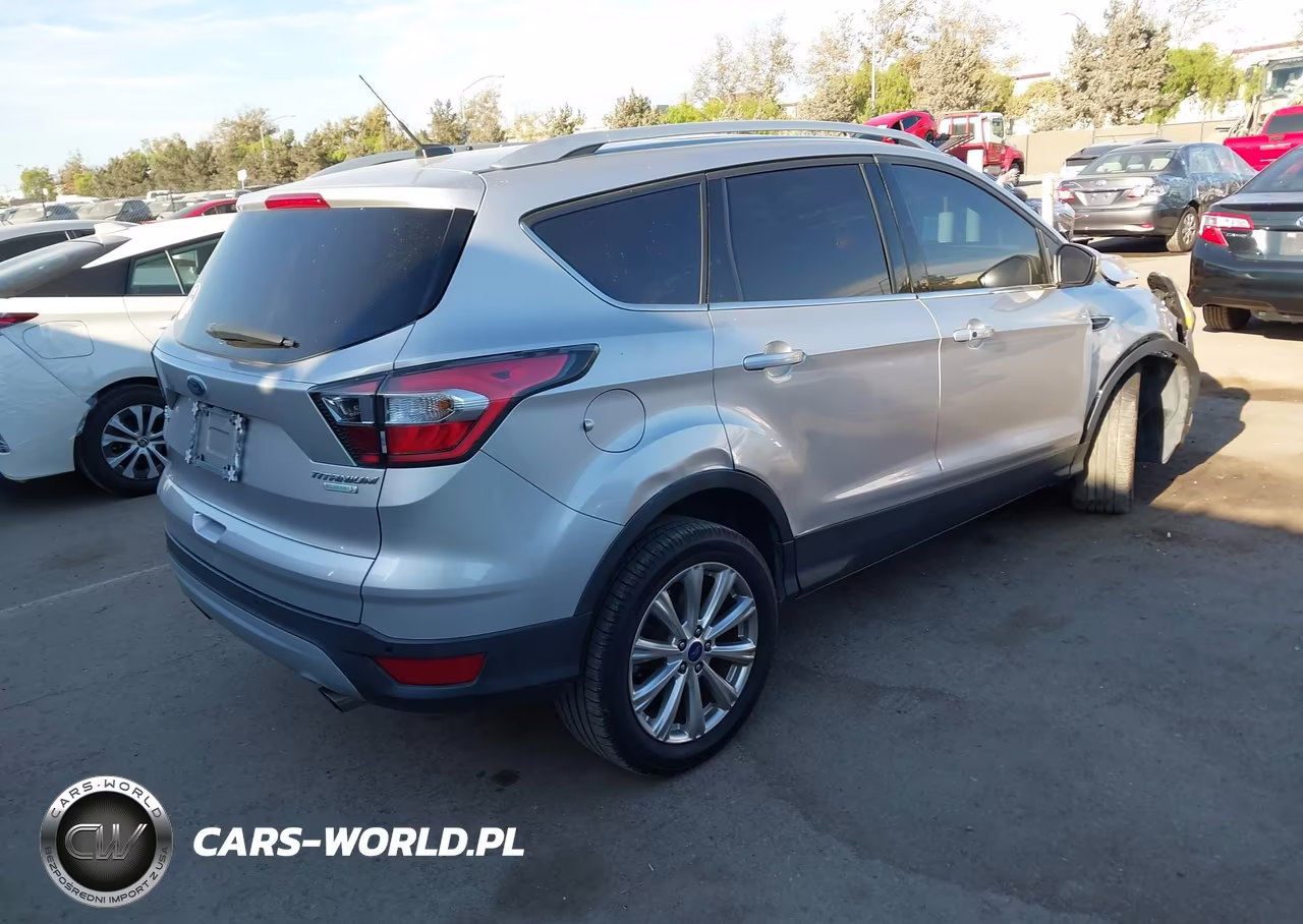 2017 Ford Escape Titanium VIN:1FMCU0J97HUA94974 - 4