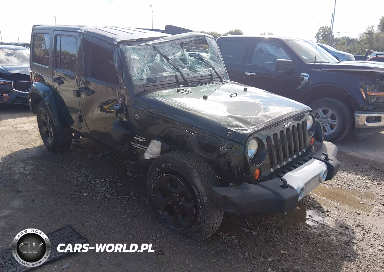 2012 Jeep Wrangler Unlimited Sahara VIN:1C4BJWEG0CL103890 - 1