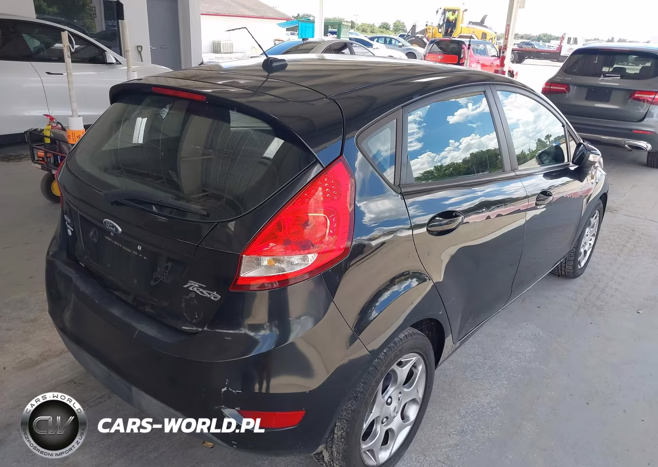 2011 Ford Fiesta Ses VIN:3FADP4FJ2BM175201 - 4