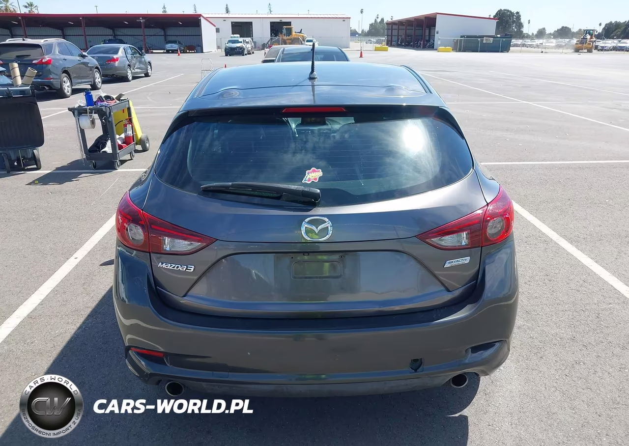 2018 Mazda Mazda3 Touring VIN:3MZBN1L36JM261389 - 17