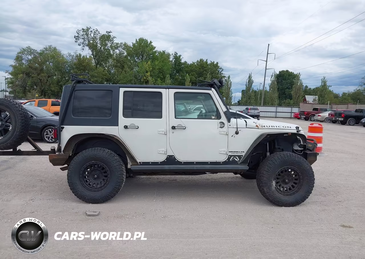 2008 Jeep Wrangler Unlimited Rubicon VIN:1J4GA69128L599661 - 13