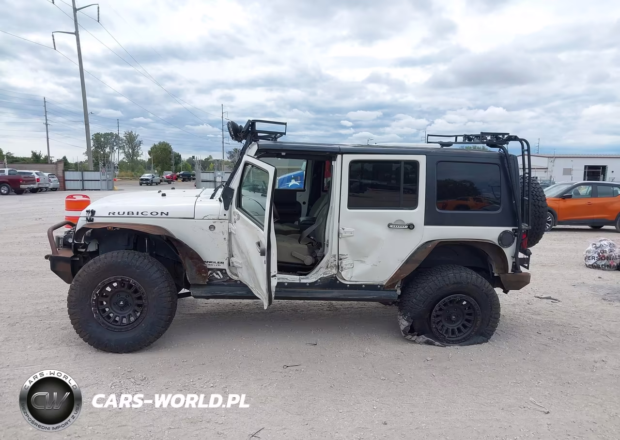 2008 Jeep Wrangler Unlimited Rubicon VIN:1J4GA69128L599661 - 14