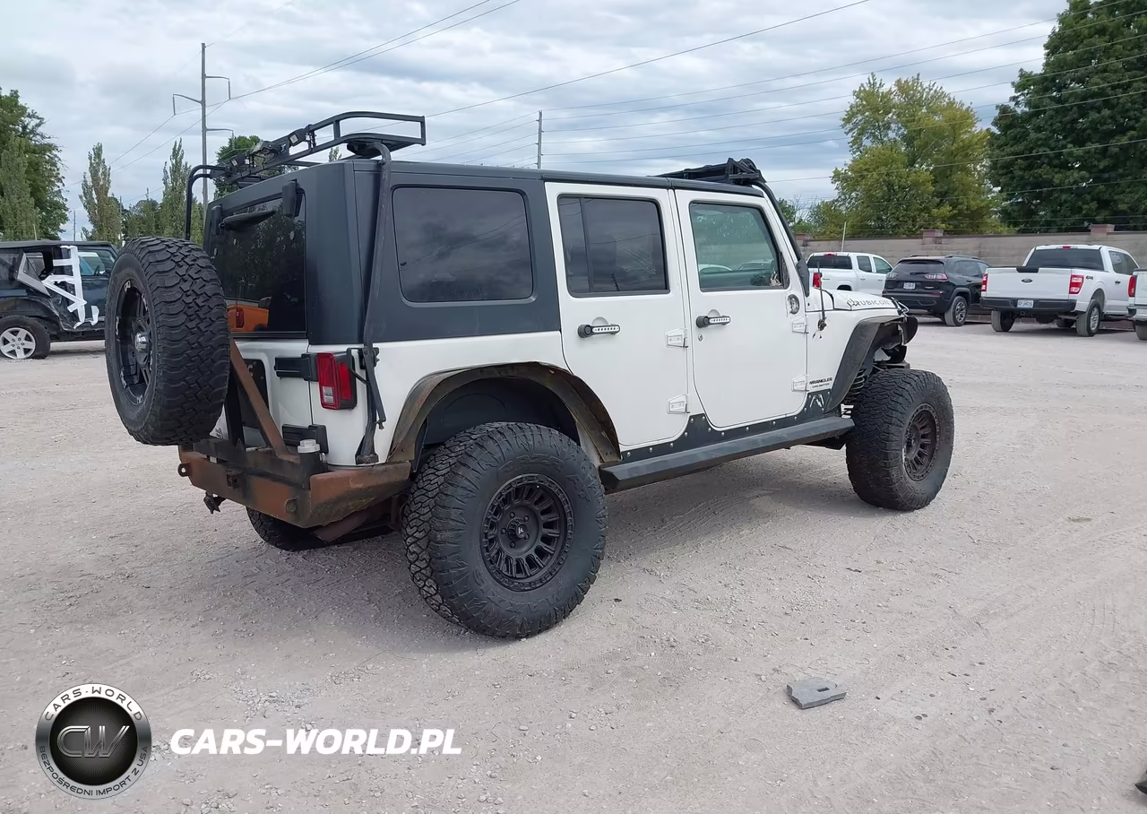 2008 Jeep Wrangler Unlimited Rubicon VIN:1J4GA69128L599661 - 4
